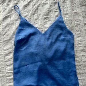 blouse with knot at back.